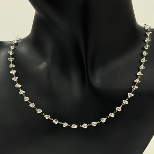 White stones around necklace