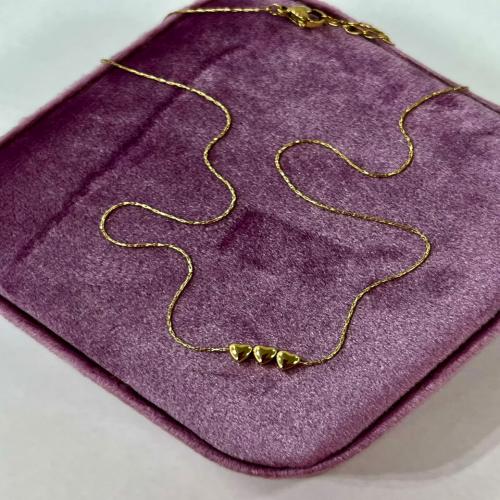 triple bold heart necklace